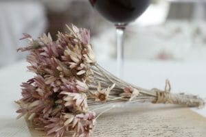 dry flowers, letters, wine